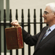 Image for article titled Here’s why Brits brandish that weird little red suitcase on budget day